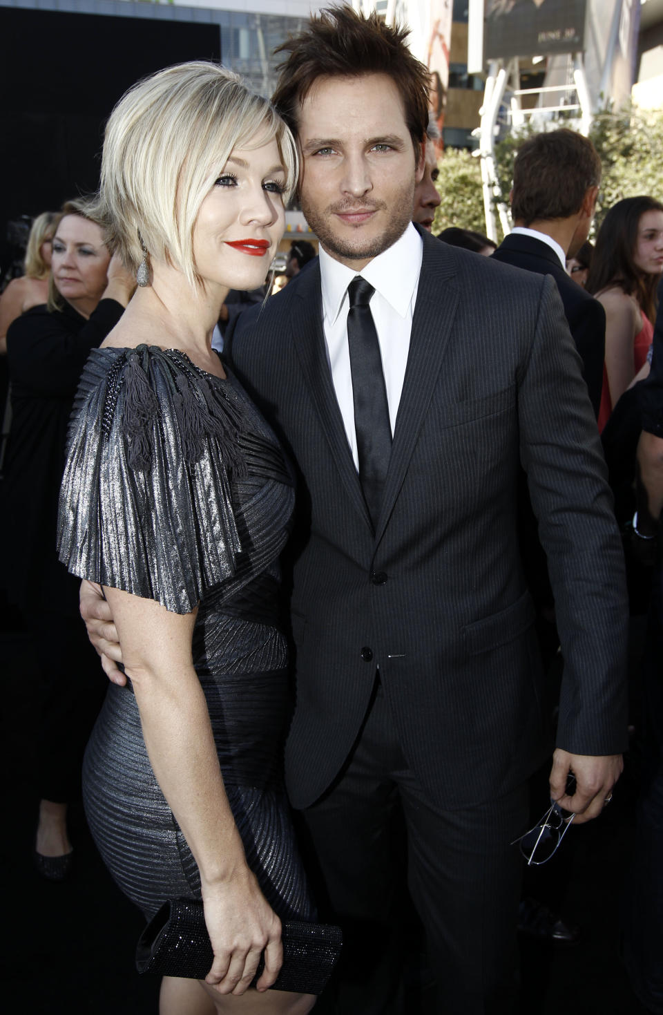 FILE - In this June 24, 2010 file photo, actress Jennie Garth, left, and her husband actor Peter Facinelli arrive at the premiere of "The Twilight Saga: Eclipse" in Los Angeles. The couple filed for divorce in Los Angeles on Wednesday, March 28, 2012, citing irreconcilable differences for their breakup after nearly 11 years of marriage. They have three children together. (AP Photo/Matt Sayles, file)