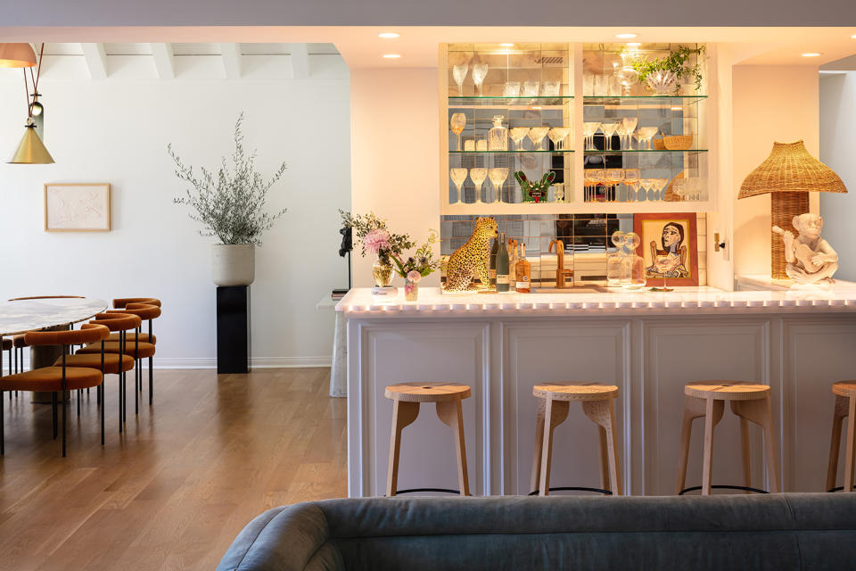 home bar with marble countertop and rattan table lamp