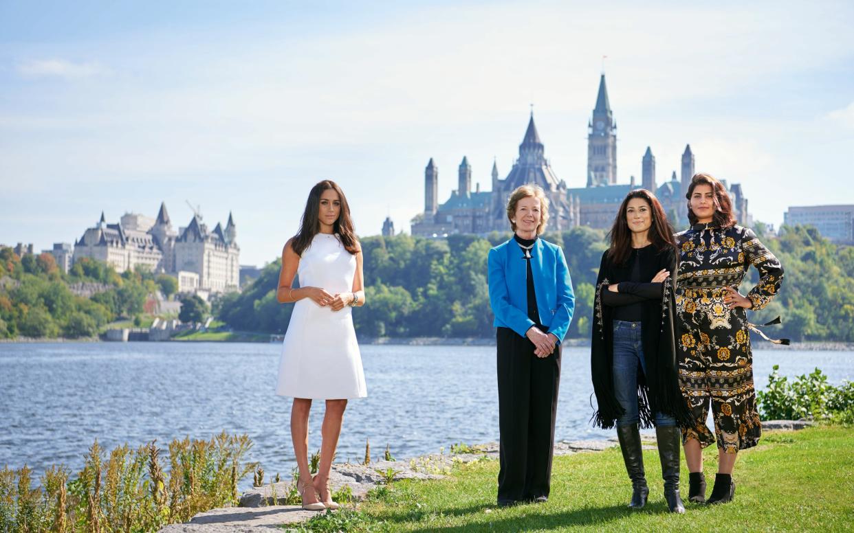 Meghan Markle appears in the April issue of Vanity Fair along with Saudi activist Loujain al-Hathloul at the One Young World Summit in Ottawa in October 2016.  - Jason Schmidt