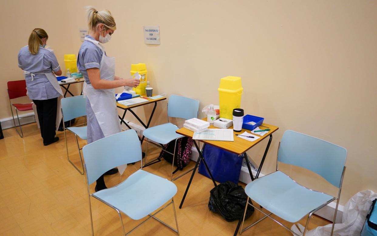 Medical workers prepare to vaccinate pupils at a school in Newcastle earlier this month - Ian Forsyth/Getty Images Europe