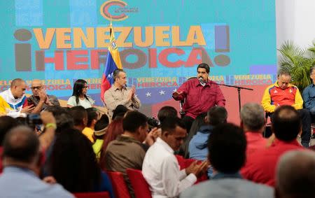 Venezuela's President Nicolas Maduro (2nd R) speaks during a meeting with members of the Constituent Assembly in Caracas, Venezuela August 2, 2017. The text in the back reads, "Heroic Venezuela". Miraflores Palace/Handout via REUTERS