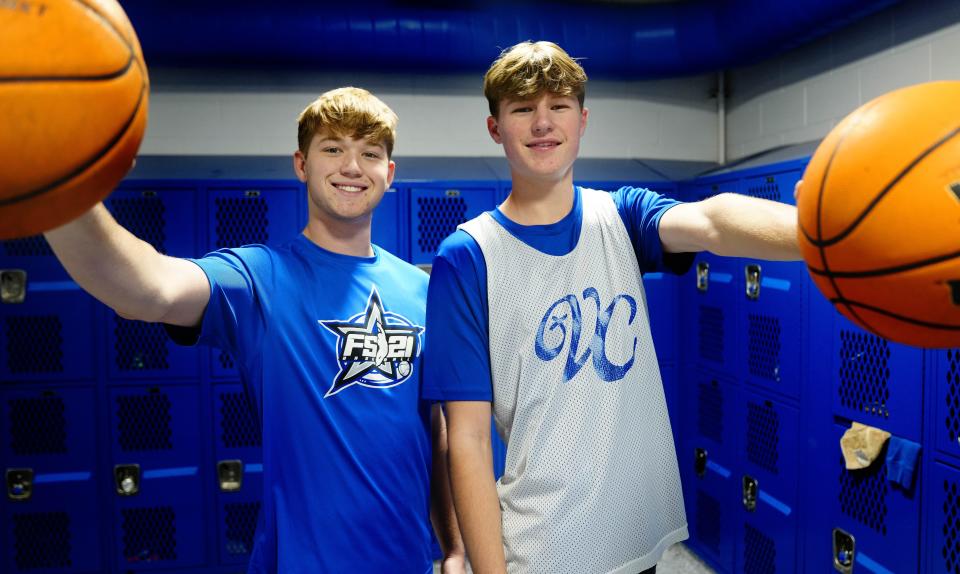 Valley Christian twins Carson (right) and Kyle Grier pose for a portrait in the locker room at Valley Christian High School in Chandler on Jan. 23, 2024.