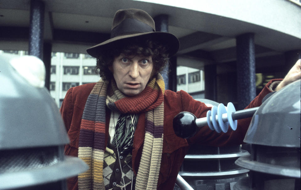 LONDON, ENGLAND - JANUARY 01:  English actor Tom Baker in his role as the fourth incarnation of Doctor Who in the British science fiction television series of the same name, circa 1975. With him are two of his arch-enemies the Daleks. (Photo by Anwar Hussein/Hulton Archive/Getty Images)