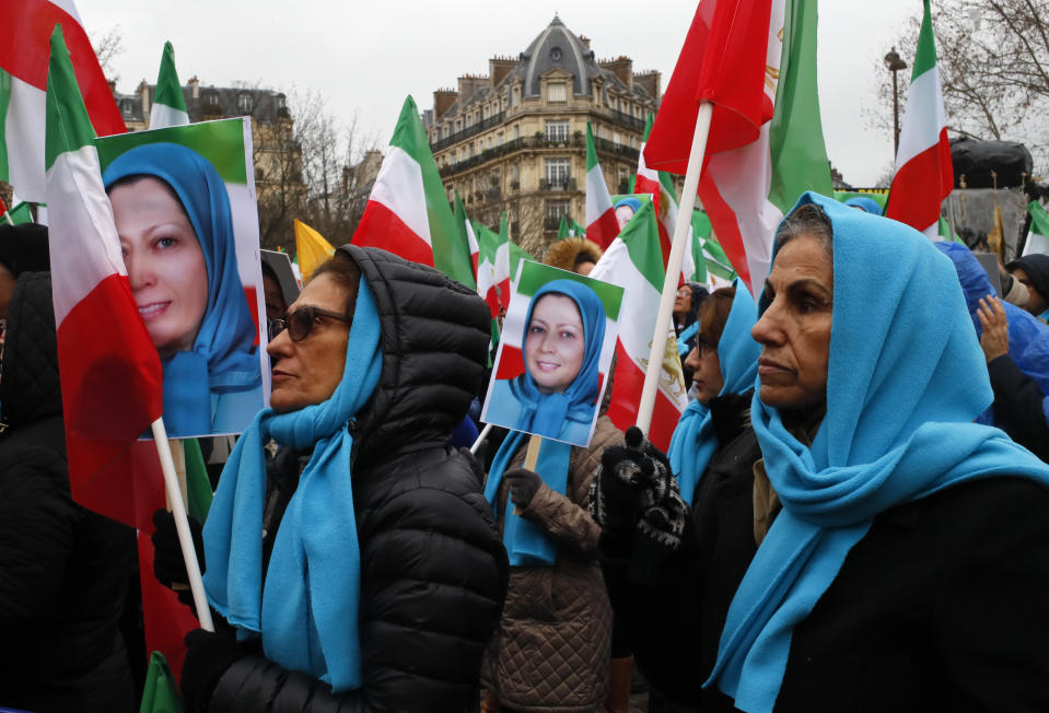Demosntrators carry posters of Maryam Rajavi, the leader of the National Council of Resistance of Iran, during a protest in Paris, Friday Feb.8, 2019 as Iran marks the 40th anniversary of its Islamic Revolution. (AP Photo/Francois Mori)