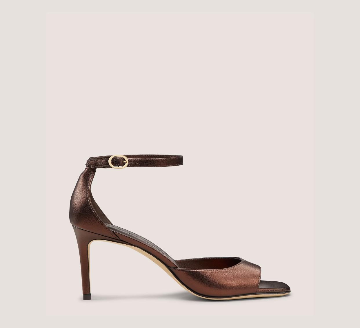 <p><a href="https://go.redirectingat.com?id=74968X1596630&url=https%3A%2F%2Fwww.stuartweitzman.com%2Fproducts%2Fnudistia-75-sandal%2FSI242-MOC.html%3Ffrp%3DSI242%2BMOC%2B%2B8.5%2BC%26fromSearch%3Dextra%2Bwide%2Bheel&sref=https%3A%2F%2Fwww.harpersbazaar.com%2Fshopping%2Fg44374813%2Fbest-heels-for-wide-feet%2F" data-i13n="elm:affiliate_link;elmt:premonetized" rel="sponsored" target="_blank" data-ylk="slk:Shop Now;elm:affiliate_link;elmt:premonetized;itc:0;sec:content-canvas" class="link rapid-noclick-resp rapid-with-clickid etailiffa-link">Shop Now</a></p> <p>Nudistia 75 Sandal</p>  <p>$475.00</p><span class="copyright">stuartweitzman.com</span>