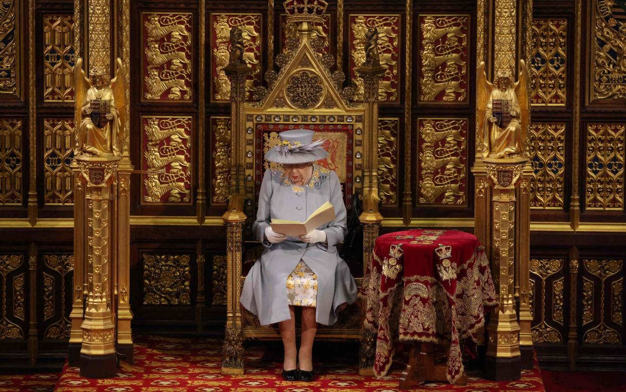 Britain's Queen Elizabeth II reads the Queen's Speech on the Sovereign's Throne in the House of Lords chamber during the State Opening of Parliament at the Houses of Parliament in London - CHRIS JACKSON /AFP