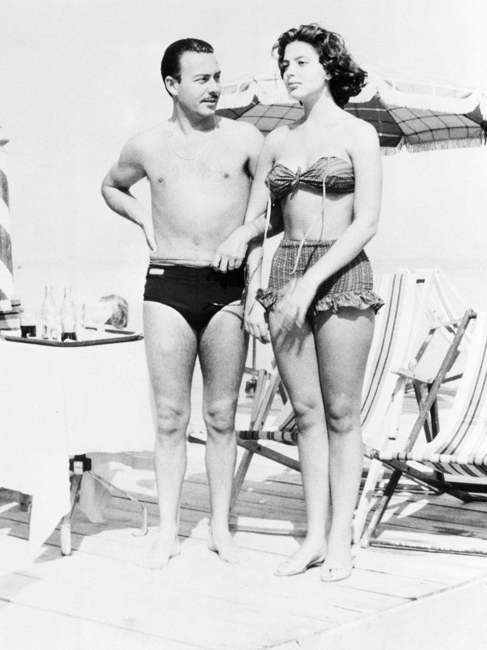 <p>The royal and her new husband take in some rays on the shore of Lake Garda in Northern Italy.</p>