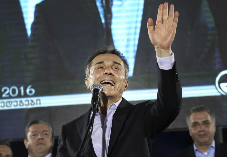FILE - Georgian businessman Bidzina Ivanishvili greets supporters during a rally in Tbilisi, Georgia, Oct. 8, 2016. A Singapore court ruled Friday, May 26, 2023, that Credit Suisse owes billionaire and former Georgian Prime Minister Bidzina Ivanishvili hundreds of millions of dollars for failing to protect his money in a trust pilfered by a manager, the latest scandal for the Swiss bank whose years of problems led to its takeover by a rival. (AP Photo/Sergei Grits, file)