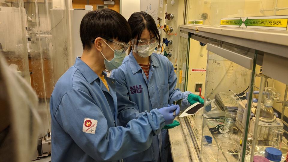Researchers Haiyue Huang (right) and Hun Park at Northwestern University's McCormick School of Engineering..