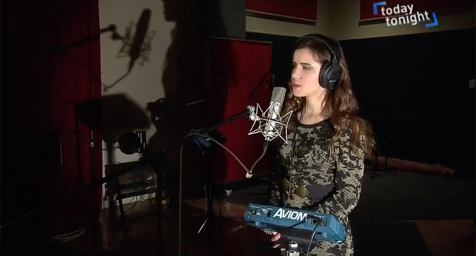 Rachael Leahcar, 25, is legally blind, yet overcame the odds to forge a successful singing career. Source: Today Tonight