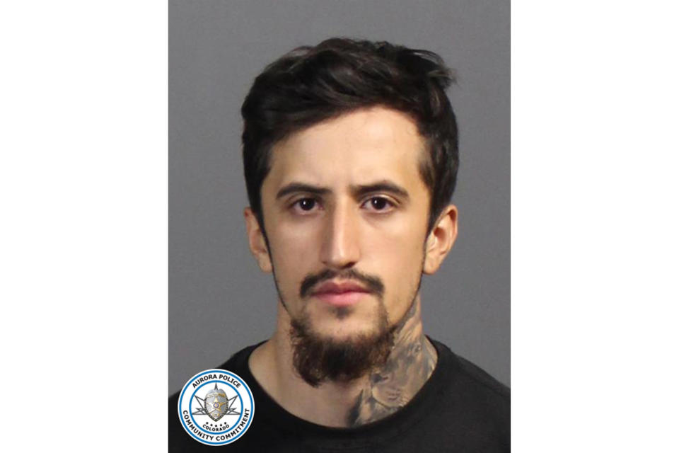 In this undated photo released by the Aurora Police Department is Joseph Mario Castorena. Court records say Castorena who is suspected of killing four people at his ex-girlfriend's home in suburban Denver on Sunday, Oct. 30, 2022, allegedly threatened to kill her a week before. Police were searching Monday, Oct. 31, 2022, for 21-year-old Castorena in connection with the shooting that left three men and a woman dead in Aurora. (Aurora Police Department via AP)