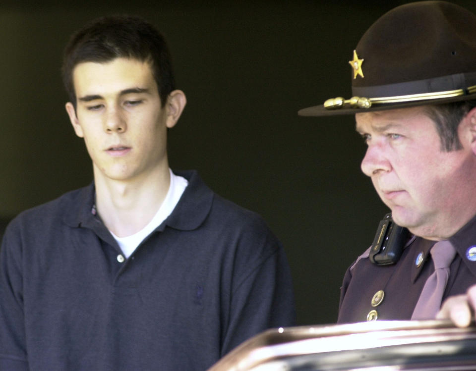 FILE - In this Dec. 7, 2001 file photo, James Parker is brought into court in Haverhill, N.H. where he faces charges in connection with the stabbing deaths of two Dartmouth College professors. Parker, who has served more than half of his life in prison for his role in the 2001 stabbing deaths of two married Dartmouth College professors as part of a plan to rob and kill people before fleeing overseas is getting his first chance at parole on Thursday, April 18, 2024. (AP Photo/Toby Talbot, File)