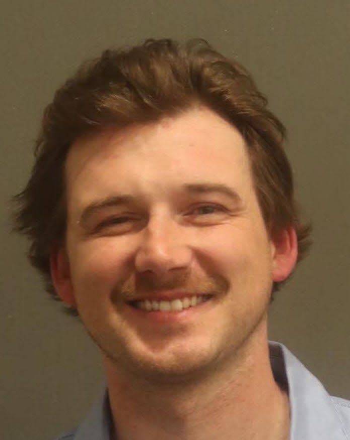 Morgan Wallen's mugshot shows the singer smiling