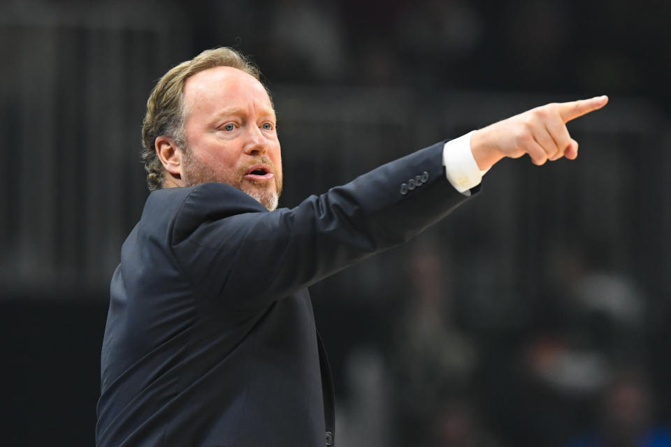 Milwaukee Bucks coach Mike Budenholzer gestures from the sideline during the second half of an NBA basketball game against the Atlanta Hawks, Friday, Dec. 27, 2019, in Atlanta. (AP Photo/John Amis)