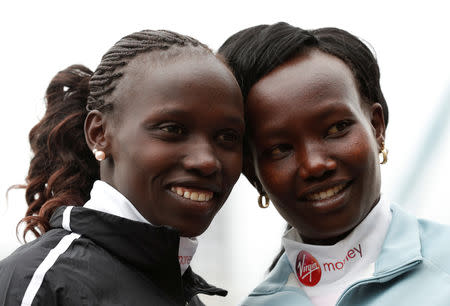 Athletics - London Marathon Preview Press Conference - The Tower Hotel, London, Britain - April 25, 2019 Kenya's Vivian Cheruiyot and Mary Keitany pose ahead of the London marathon Action Images via Reuters/Matthew Childs