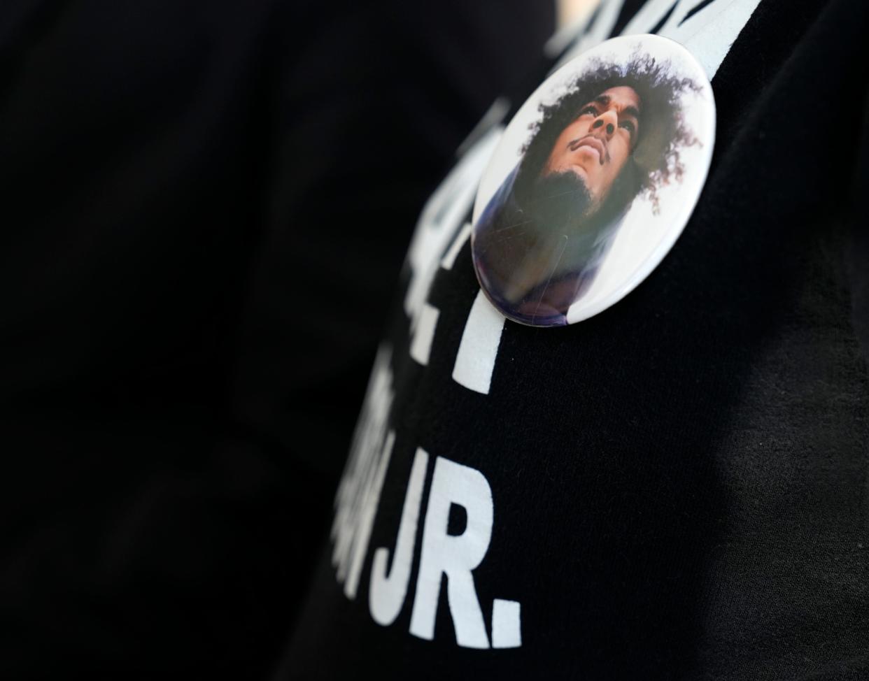 Feb. 23, 2023; Columbus, Ohio, USA;  Tamala Payne, Casey Goodson Jr.'s mother, wears a picture of Goodson and a shirt that read, "I am Casey Goodson Jr." during a court appearance by Jason Meade in Franklin County Common Pleas on Thursday. Meade, a former county Sheriff's Office SWAT deputy, is facing charges of murder and reckless homicide for fatally shooting 23-year-old Casey Goodson on Dec. 4, 2020. Mandatory Credit: Barbara J. Perenic/Columbus Dispatch