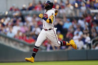 Atlanta Braves' Ronald Acuna Jr. runs to second base after hitting a double in the first inning of the team's baseball game against the Boston Red Sox on Wednesday, June 16, 2021, in Atlanta. (AP Photo/John Bazemore)