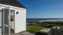 <p>The kitchen door to one cottage. (Credit: <a href="http://bit.ly/1NSd4Bv" rel="nofollow noopener" target="_blank" data-ylk="slk:Douglas Elliman Real Estate listing;elm:context_link;itc:0;sec:content-canvas" class="link ">Douglas Elliman Real Estate listing</a>)</p>