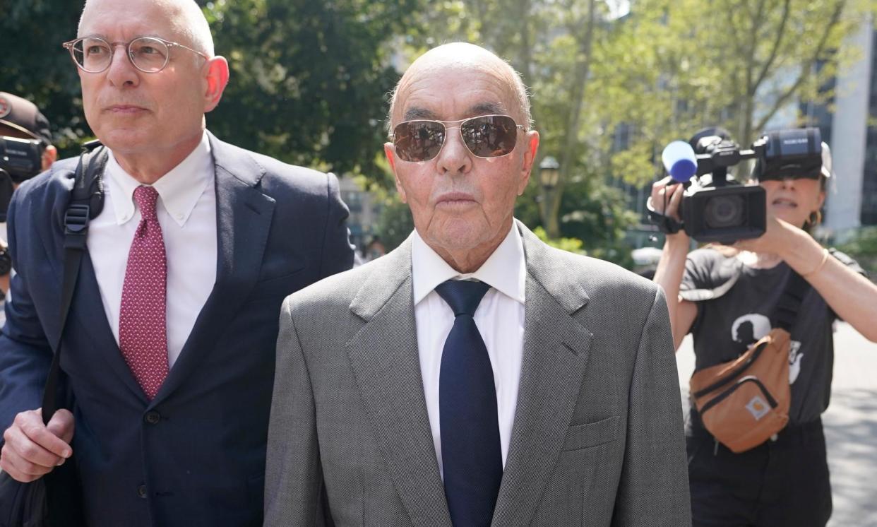 <span>Joe Lewis leaves Manhattan federal court on 26 July 2023, in New York.</span><span>Photograph: Mary Altaffer/AP</span>