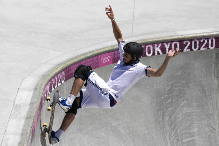 Cory Juneau of the United States competes in the men's park skateboarding prelims at the 2020 Summer Olympics, Thursday, Aug. 5, 2021, in Tokyo, Japan. (AP Photo/Ben Curtis)