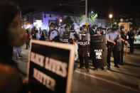 <p>Demonstrators confront police while protesting the acquittal of former St. Louis police officer Jason Stockley on Sept. 16, 2017 in St. Louis, Mo. (Photo: Scott Olson/Getty Images) </p>