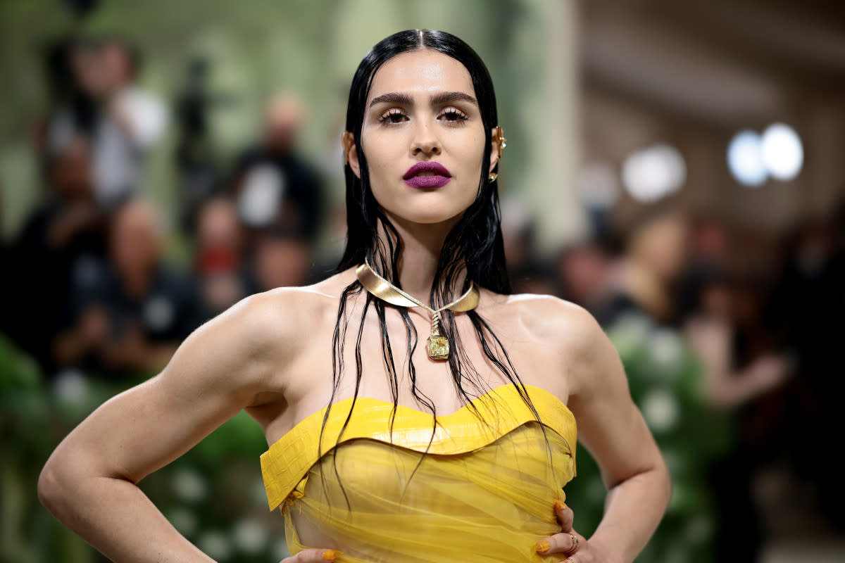 <p>Photo by Dimitrios Kambouris/Getty Images for The Met Museum/Vogue</p><p>Model and television personality Amelia Gray Hamlin tucked her hair into her necklace for a look that's slightly reminiscent of "scary ghost girls in horror movies."</p>