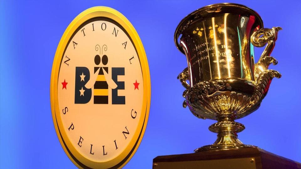 NATIONAL SPELLING BEE logo and trophy on blue texture, partial graphic