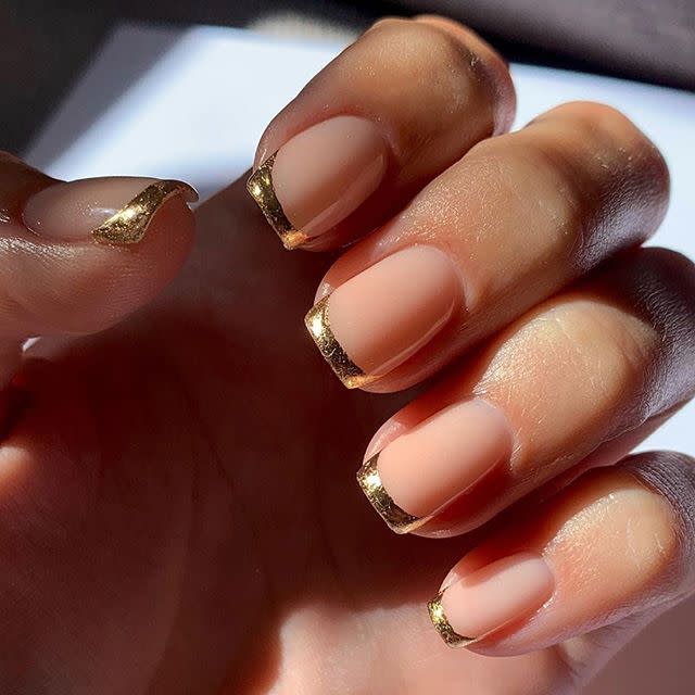 <p>If you wanna make your French manicure feel that little bit less summery, these gold tips are just the answer.</p><p><a href="https://www.instagram.com/p/CFnGjqzJubw/" rel="nofollow noopener" target="_blank" data-ylk="slk:See the original post on Instagram;elm:context_link;itc:0;sec:content-canvas" class="link ">See the original post on Instagram</a></p>