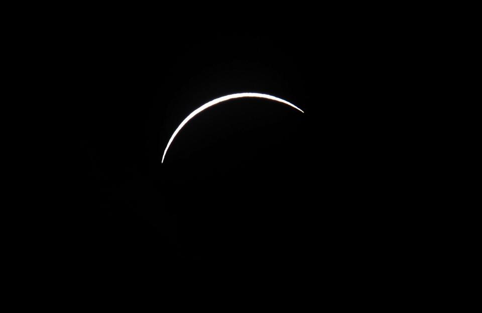 PALM COVE, AUSTRALIA - NOVEMBER 14: Near totality is seen during the solar eclipse at Palm Cove on November 14, 2012 in Palm Cove, Australia. Thousands of eclipse-watchers have gathered in part of North Queensland to enjoy the solar eclipse, the first in Australia in a decade. (Photo by Ian Hitchcock/Getty Images)