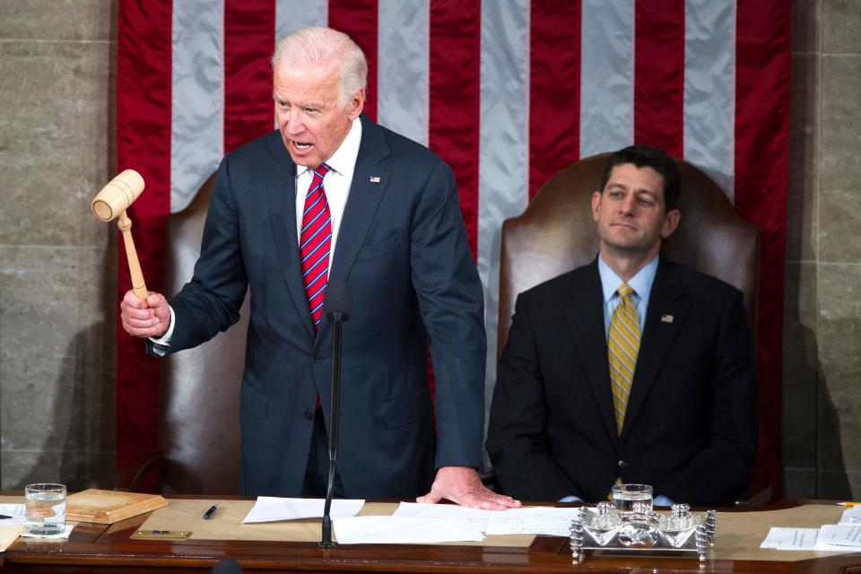 Vice President Joe Biden, next to House Speaker Paul Ryan, declares that Congress certifies Donald Trump's presidential victory during a joint session of Congress on Capitol Hill in Washington on Jan. 6, 2017.