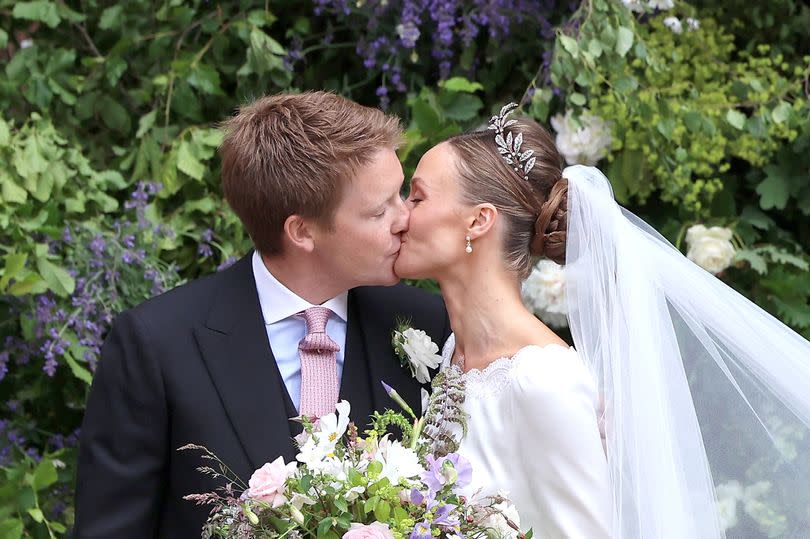 Hugh Grosvenor, Duke of Westminster and Olivia Grosvenor, Duchess of Westminster kiss after their wedding ceremony