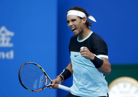 Rafa Nadal of Spain reacts after beating Jack Sock of U.S. during their men's singles match at the China Open tennis tournament in Beijing, China, October 9, 2015. REUTERS/Kim Kyung-Hoon