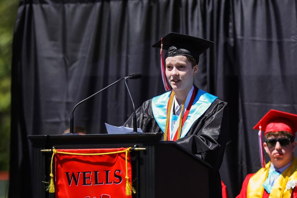 Valedictorian Anavi Curtiss speaks during commencement at Wells High School on Sunday.