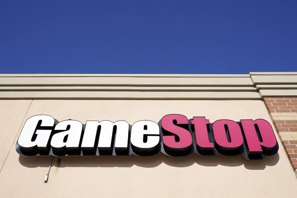 FILE - In this file photo, a GameStop sign is displayed above a store in Urbandale, Iowa, Jan. 28, 2021. GameStop shares are falling ahead of the market open on Thursday, June 8, 2023, as the video game company a has fired CEO Matthew Furlong and named Ryan Cohen as executive chairman.  (AP Photo/Charlie Neibergall, File)