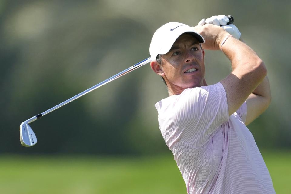 Rory McIlroy of Northern Ireland plays his second shot on the 13th hole during the third round of the Hero Dubai Desert Classic golf tournament, in Dubai, United Arab Emirates, Saturday, Jan. 20, 2024. (AP Photo/Kamran Jebreili)