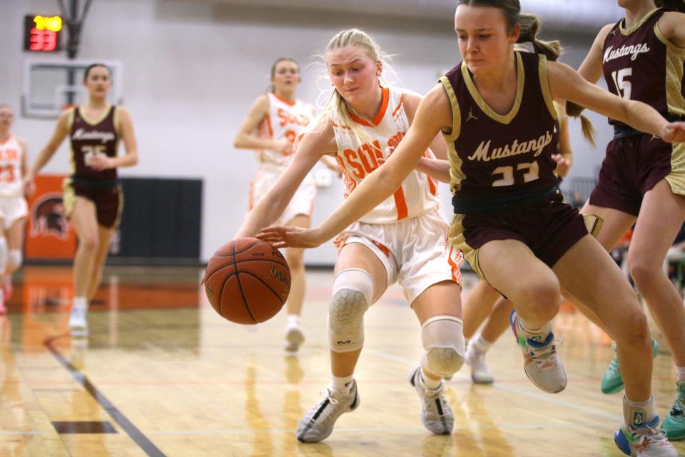 Solon’s Kobi Lietz (1) was one of the Spartans' defensive anchors against Davis County on Wednesday.