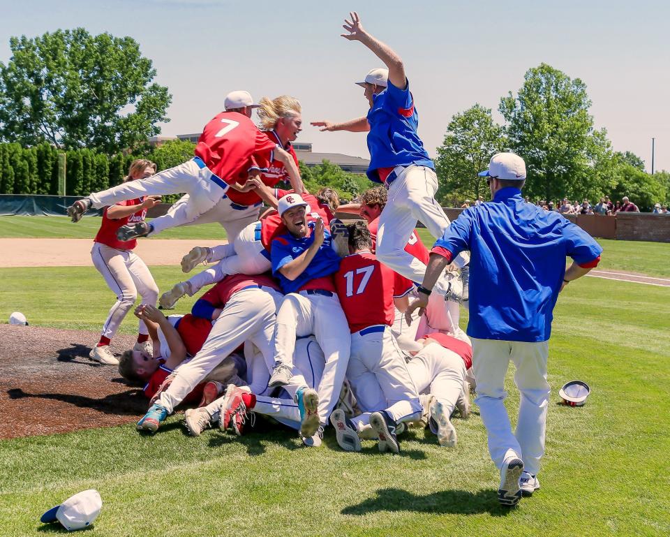 The Grove City baseball team celebrates its Division I regional title after a 2-0 win over 2021 state champion New Albany on June 4 at Dublin Coffman.