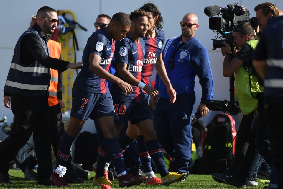 Neymar was the subject of interest from cameramen and security alike after celebrating in front of Nimes fans. (Getty)