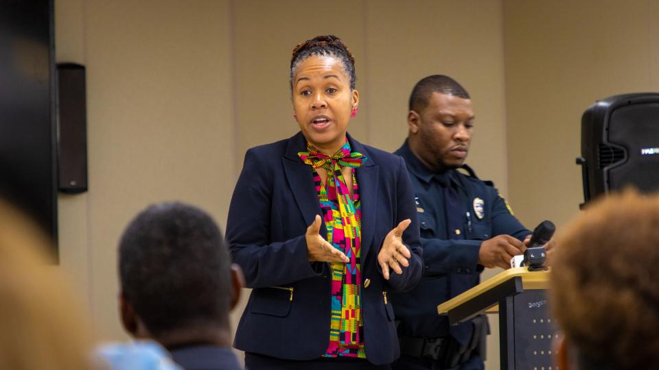 Ninth Judicial Circuit Court State Attorney Monique Worrell speaks to a crowd on Dec. 6, 2022.