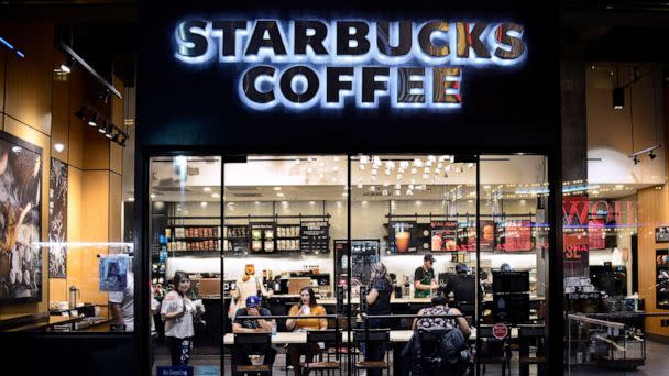 PHOTO: Customers eat and drink in a Starbucks Coffee shop in New York City. (Robert Alexander/Getty Images, FILE)