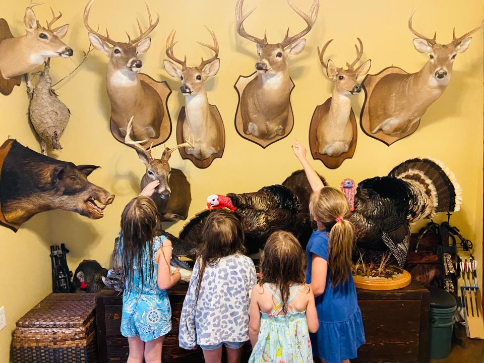 Friends' kids checking out my trophy room