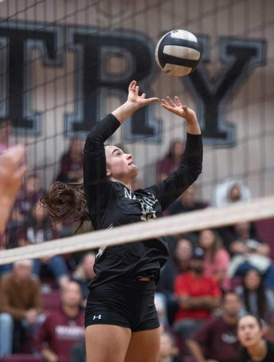 Julia Irmen (15) plays the ball during the Pace vs Navarre 1-6A District volleyball tournament at Navarre High School on Tuesday, Oct. 17, 2023.