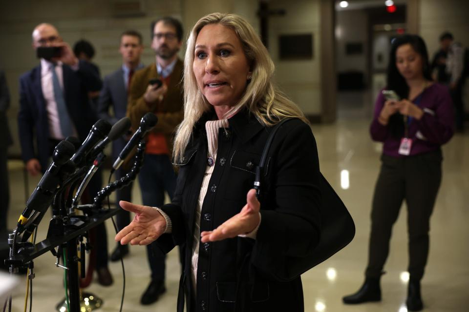 Rep. Marjorie Taylor Greene, R-Ga., speaks to members of the press on Nov. 15, 2022.