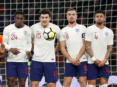 Soccer Football - International Friendly - Netherlands vs England - Johan Cruijff Arena, Amsterdam, Netherlands - March 23, 2018 England’s Danny Welbeck, Harry Maguire, Jordan Henderson and Kyle Walker in a wall against a freekick from Netherlands' Memphis Depay Action Images via Reuters/John Sibley