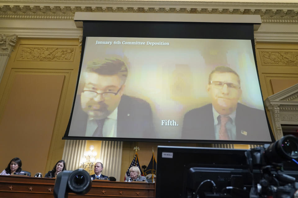 FILE - A exhibit showing a deposition with former national security adviser Michael Flynn is displayed, as the House select committee investigating the Jan. 6 attack on the U.S. Capitol continues to reveal its findings of a year-long investigation, at the Capitol in Washington, Tuesday, June 28, 2022. Flynn refused to say whether he believed the violence was justified, or even whether he believed in the peaceful transition of power. Instead, he invoked his Fifth Amendment right not to incriminate himself. (AP Photo/Jacquelyn Martin, File)