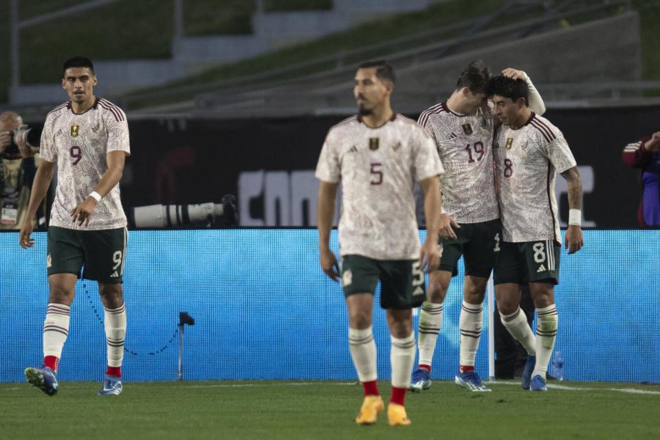 Mexico midfielder Jordi Cortizo (19) and midfiel