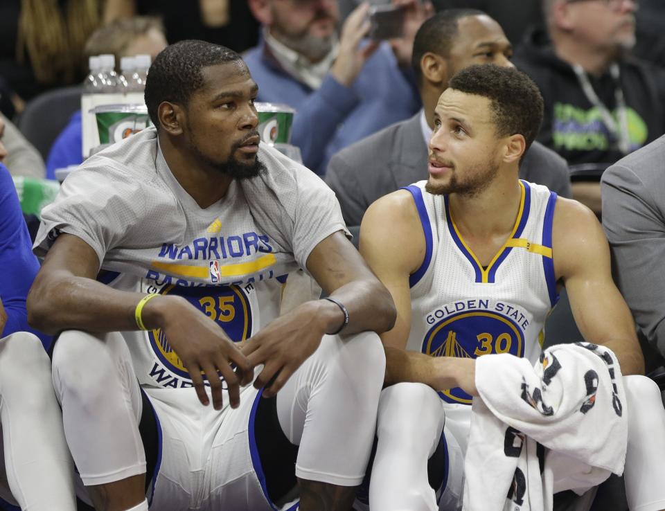 Kevin Durant and Stephen Curry will alter the Warriors’ salary situation. (AP)