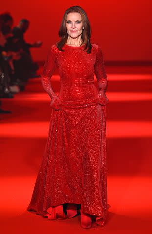 <p>Kristy Sparow/Getty</p> Marcia Cross fires up Paris Fashion Week in bold red gown at Vetements