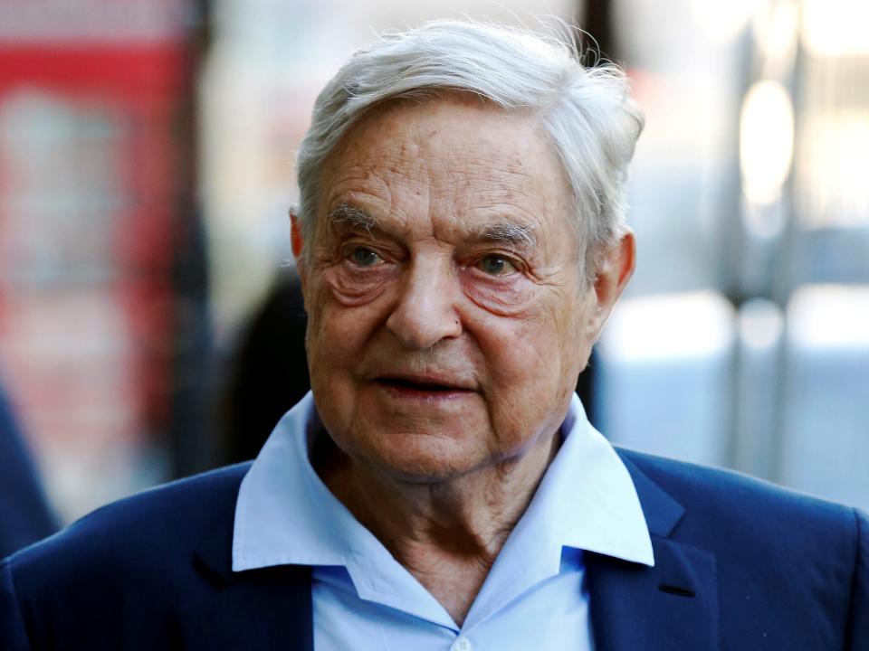 FILE PHOTO - Business magnate George Soros arrives to speak at the Open Russia Club in London, Britain June 20, 2016. REUTERS/Luke MacGregor/File Photo