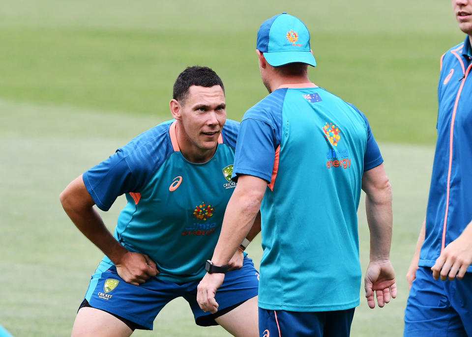 Pictured left, Fast bowler Scott Boland training with the Australian squad ahead of the second Test against the West Indies at the Adelaide Oval. 
